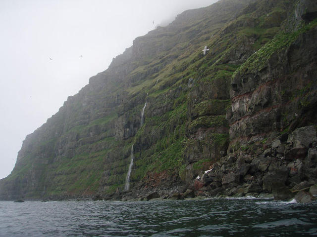 Rounding the headland, waterfalls and more bird cliffs