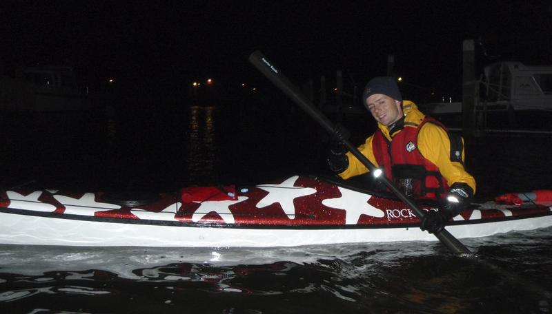 Night paddle -- a student tries out my carbon Greenland paddle